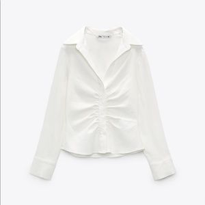 Camisa elastica entallada Zara too